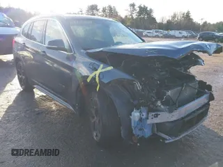 2016 BMW X1 xDrive28i with VIN WBXHT3C30GP881837, listed as a IAAI auction lot 41117389 with 84,157 mi miles. Bid and sale history available at carsss.com. Image 1.
