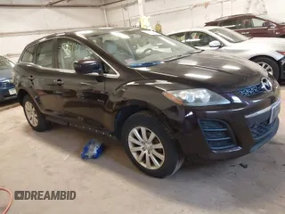 2011 Mazda CX-7 i SV with VIN JM3ER2A55B0381601, listed as a IAAI auction lot 41923942 with 136,771 mi miles. Bid and sale history available at carsss.com. Image 1.