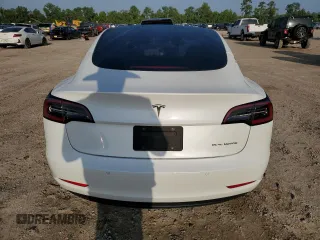 2021 Tesla Model 3 Long Range z VIN 5YJ3E1EB7MF044096, wystawiony jako Copart lot #56300355 z przebiegiem 87 677 mil mil oraz Szkoda całkowita • Salvage title. Historia ofert i sprzedaży dostępna na DreamBid. Obrazek 6.