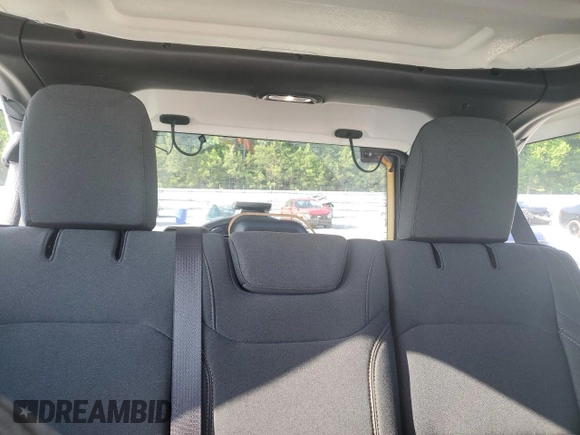 2024 Jeep Wrangler Sport S with VIN 1C4PJXDN6RW297070, listed as a Copart auction lot 56965465 with 21,872 mi miles and Salvage title. Bid and sale history available at DreamBid. Image 10.