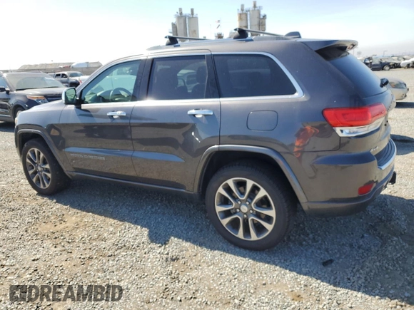 2017 Jeep Grand Cherokee Overland with VIN 1C4RJFCG3HC772695, listed as a Copart auction lot 64071635 with 90,710 mi miles and Clean title. Bid and sale history available at DreamBid. Image 2.