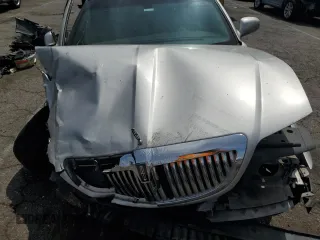 2003 Lincoln Town Car Executive z VIN 1LNHM81W33Y653643, wystawiony jako Copart lot #58824145 z przebiegiem Nie podano mil oraz Szkoda całkowita • Salvage title. Historia ofert i sprzedaży dostępna na DreamBid. Obrazek 11.