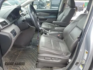 2016 Honda Odyssey EX-L with VIN 5FNRL5H65GB040719, listed as a Copart auction lot 54587295 with 231,302 mi miles and Salvage Title. Bid and sale history available at DreamBid. Image 7.