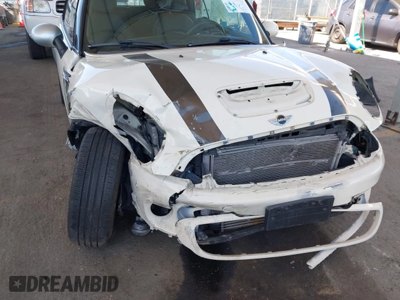 2014 MINI Convertible S with VIN WMWZP3C5XET706911, listed as a IAAI auction lot 42217410 with 54,649 mi miles and . Bid and sale history available at DreamBid. Image 6.