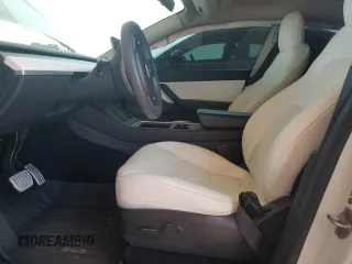 2021 Tesla Model Y Performance z VIN 5YJYGDEF5MF215870, wystawiony jako Copart lot #52531015 z przebiegiem 21 904 mil mil oraz Szkoda całkowita • Salvage title. Historia ofert i sprzedaży dostępna na DreamBid. Obrazek 7.