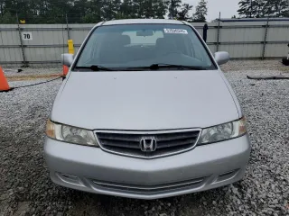 2004 Honda Odyssey EX-L with VIN 5FNRL18044B069774, listed as a Copart auction lot 57096535 with 165,307 mi miles and Salvage title. Bid and sale history available at DreamBid. Image 5.