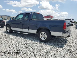 2002 Ford F-150 XL with VIN 1FTRX17222KB05081, listed as a Copart auction lot 56459765 with 126,941 mi miles and Salvage title. Bid and sale history available at DreamBid. Image 2.