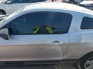 2012 Ford Mustang Premium with VIN 1ZVBP8AM5C5234532, listed as a IAAI auction lot 41860791 with 106,929 mi miles and . Bid and sale history available at DreamBid. Image 14.