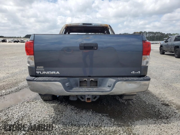 2010 Toyota Tundra с VIN 5TFUM5F15AX005061, выставлен на аукционе Copart как лот 51823565 с пробегом Не указан миль и Списание • Salvage title. История ставок и продаж доступна на DreamBid. Изображение 6.