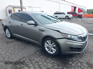 2012 Kia Optima EX with VIN 5XXGN4A76CG022770, listed as a IAAI auction lot 41825939 with 214,445 mi miles. Bid and sale history available at carsss.com. Image 1.