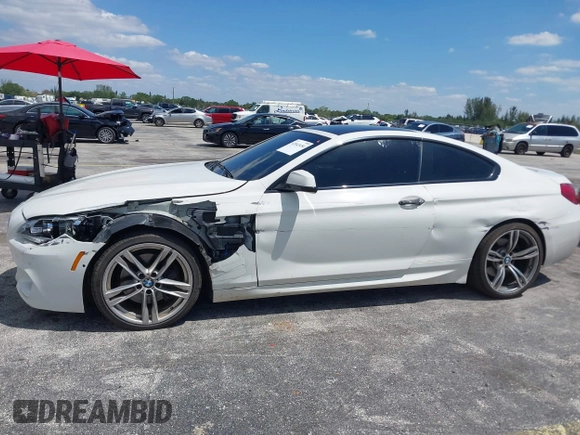 2014 BMW 6 Series 650i with VIN WBAYM9C55ED248244, listed as a IAAI auction lot 42043456 with 144,664 mi miles and . Bid and sale history available at DreamBid. Image 6.