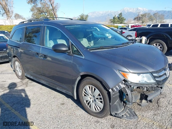 2014 Honda Odyssey LX with VIN 5FNRL5H23EB015067, listed as a IAAI auction lot 41760301 with 167,389 mi miles. Bid and sale history available at carsss.com. Image 1.