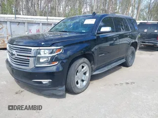 2015 Chevrolet Tahoe LTZ with VIN 1GNSKCKC8FR514671, listed as a IAAI auction lot 42157084 with 182,665 mi miles and . Bid and sale history available at DreamBid. Image 18.