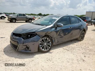 2014 Toyota Corolla L with VIN 5YFBURHE6EP038444, listed as a Copart auction lot 57100945 with 133,120 mi miles and Salvage title. Bid and sale history available at DreamBid. Image 1.