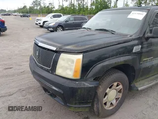 2003 Cadillac Escalade z VIN 1GYEK63N73R203813, wystawiony jako IAAI lot #42138841 z przebiegiem 68 483 mil mil oraz . Historia ofert i sprzedaży dostępna na DreamBid. Obrazek 6.