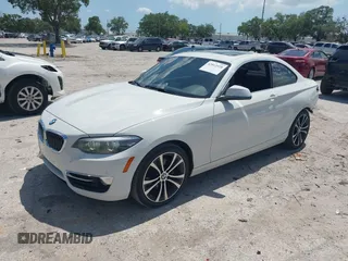2020 BMW 2 Series 230i with VIN WBA2J1C05L7E54523, listed as a IAAI auction lot 42013928 with 43,659 mi miles. Bid and sale history available at carsss.com. Image 2.