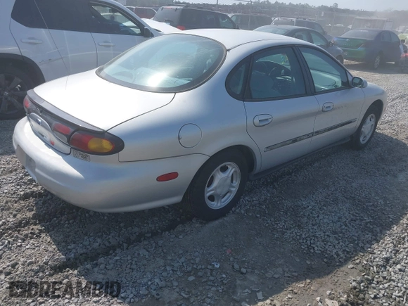 1997 Ford Taurus GL z VIN 1FALP52U9VA295404, wystawiony jako IAAI lot #42234839 z przebiegiem 163 080 mil mil oraz . Historia ofert i sprzedaży dostępna na DreamBid. Obrazek 4.