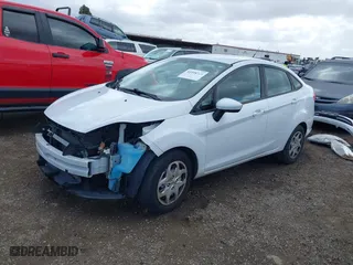 2013 Ford Fiesta S with VIN 3FADP4AJ3DM153816, listed as a IAAI auction lot 41598766 with 64,808 mi miles. Bid and sale history available at carsss.com. Image 2.