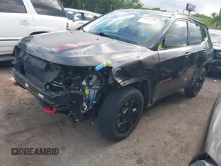 2023 Jeep Compass Trailhawk with VIN 3C4NJDDNXPT536872, listed as a IAAI auction lot 42437282 with 28,293 mi miles and . Bid and sale history available at DreamBid. Image 17.