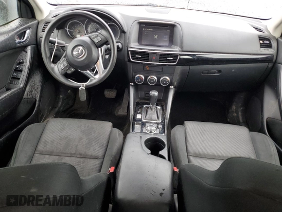 2016 Mazda CX-5 Sport z VIN JM3KE4BY5G0726376, wystawiony jako Copart lot #52009995 z przebiegiem 113 533 mil mil oraz Szkoda całkowita • Salvage title. Historia ofert i sprzedaży dostępna na DreamBid. Obrazek 8.