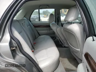 2004 Mercury Grand Marquis LS Premium z VIN 2MEFM75W34X688862, wystawiony jako Copart lot #56801635 z przebiegiem 150 371 mil mil oraz Szkody całkowita. Historia ofert i sprzedaży dostępna na DreamBid. Obrazek 11.