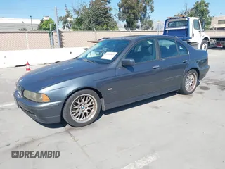 2001 BMW 5 Series 530i z VIN WBADT63461CF06054, wystawiony jako IAAI lot #42465431 z przebiegiem 215 571 mil mil oraz . Historia ofert i sprzedaży dostępna na DreamBid. Obrazek 2.