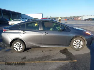 2017 Toyota Prius Two z VIN JTDKARFU4H3042976, wystawiony jako IAAI lot #41740418 z przebiegiem 66 734 mil mil oraz . Historia ofert i sprzedaży dostępna na DreamBid. Obrazek 13.