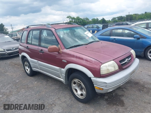 2000 Suzuki Grand Vitara JLX z VIN JS3TD62V7Y4119022, wystawiony jako IAAI lot #42384608 z przebiegiem 153 943 mil mil oraz . Historia ofert i sprzedaży dostępna na DreamBid. Obrazek 1.