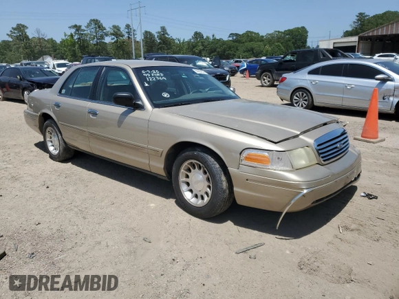 1999 Ford Crown Victoria LX z VIN 2FAFP74W1XX122364, wystawiony jako Copart lot #56929455 z przebiegiem 118 134 mil mil oraz Szkody całkowita. Historia ofert i sprzedaży dostępna na DreamBid. Obrazek 4.