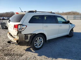 2013 Dodge Journey SXT with VIN 3C4PDCBG7DT689297, listed as a Copart auction lot 47303385 with 129,120 mi miles and Salvage Title. Bid and sale history available at carsss.com. Image 3.