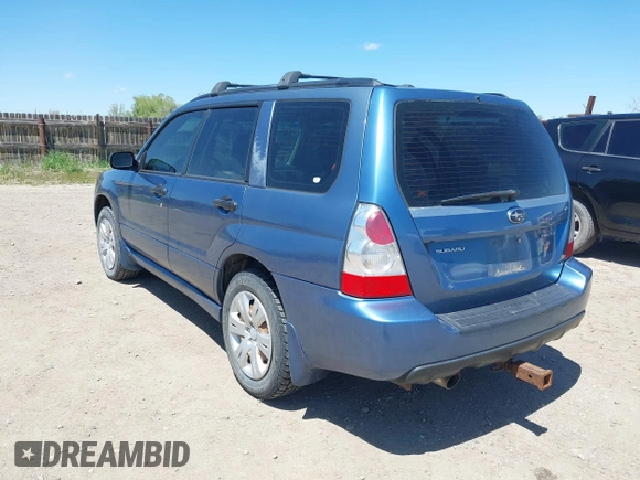 2007 Subaru Forester X with VIN JF1SG63627G718079, listed as a IAAI auction lot 42290134 with 303,089 mi miles and . Bid and sale history available at DreamBid. Image 3.