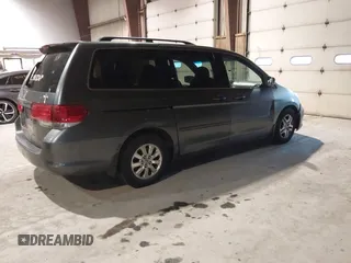 2010 Honda Odyssey EX-L with VIN 5FNRL3H78AB030111, listed as a IAAI auction lot 41250121 with 333,030 mi miles and . Bid and sale history available at DreamBid. Image 4.