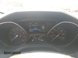 2014 Ford Focus Titanium z VIN 1FADP3N29EL409568, wystawiony jako Copart lot #62295345 z przebiegiem 53 401 mil mil oraz Szkoda całkowita • Salvage title. Historia ofert i sprzedaży dostępna na DreamBid. Obrazek 9.