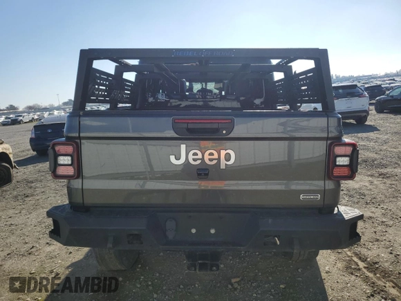 2020 Jeep Gladiator Overland с VIN 1C6HJTFG5LL131960, выставлен на аукционе Copart как лот 89385715 с пробегом 95 517 миль миль и Списание • Salvage title. История ставок и продаж доступна на DreamBid. Изображение 6.