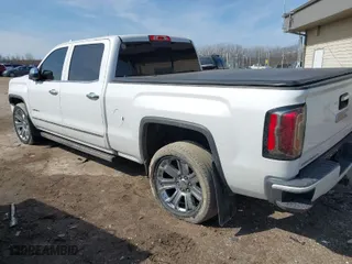 2017 GMC Sierra 1500 Denali with VIN 3GTU2PEJ5HG239623, listed as a IAAI auction lot 41783709 with 61,641 mi miles. Bid and sale history available at carsss.com. Image 3.