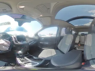 2019 Ford Escape Titanium z VIN 1FMCU9J99KUB39487, wystawiony jako Copart lot #60424765 z przebiegiem 43 094 mil mil oraz Szkoda całkowita • Salvage title. Historia ofert i sprzedaży dostępna na DreamBid. Obrazek 14.