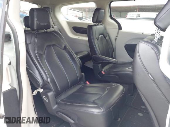 2023 Chrysler Pacifica Touring L with VIN 2C4RC1BG6PR550575, listed as a IAAI auction lot 42576498 with 54,373 mi miles and . Bid and sale history available at DreamBid. Image 8.