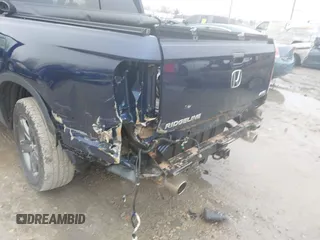 2022 Honda Ridgeline RTL-E with VIN 5FPYK3F72NB036226, listed as a IAAI auction lot 41706285 with 30,869 mi miles and . Bid and sale history available at DreamBid. Image 6.