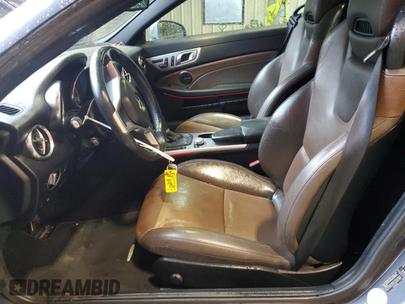 2015 Mercedes-Benz SLK 250 z VIN WDDPK4HA9FF104558, wystawiony jako Copart lot #52104545 z przebiegiem 77 054 mil mil oraz Szkoda całkowita • Salvage title. Historia ofert i sprzedaży dostępna na DreamBid. Obrazek 7.