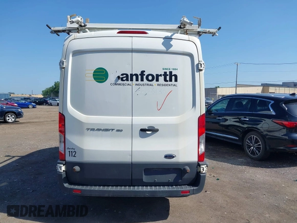 2015 Ford Transit Cargo with VIN 1FTNE2CM4FKA29323, listed as a IAAI auction lot 42406192 with 156,493 mi miles and . Bid and sale history available at DreamBid. Image 16.