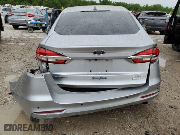 2020 Ford Fusion SEL с VIN 3FA6P0CD4LR148327, выставлен на аукционе Copart как лот 55099855 с пробегом Не указан миль и Списание • Salvage title. История ставок и продаж доступна на DreamBid. Изображение 6.