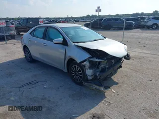 2014 Toyota Corolla L with VIN 5YFBURHE4EP096004, listed as a IAAI auction lot 42393272 with 221,353 mi miles and . Bid and sale history available at DreamBid. Image 1.