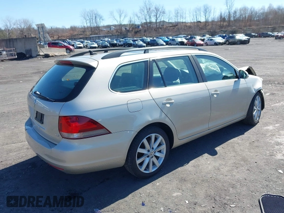 2014 Volkswagen Jetta SportWagen TDI with VIN 3VWPL7AJ8EM610672, listed as a IAAI auction lot 41811091 with 129,554 mi miles. Bid and sale history available at carsss.com. Image 4.