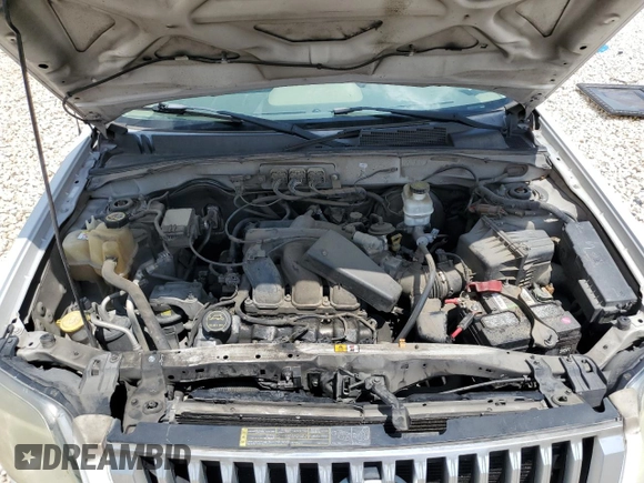 2008 Mercury Mariner Premier z VIN 4M2CU87128KJ53679, wystawiony jako Copart lot #54269815 z przebiegiem Nie podano mil oraz Szkoda całkowita • Salvage title. Historia ofert i sprzedaży dostępna na DreamBid. Obrazek 12.