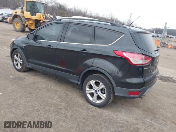 2015 Ford Escape SE with VIN 1FMCU9G90FUC66187, listed as a IAAI auction lot 41678861 with 284,548 mi miles and . Bid and sale history available at DreamBid. Image 3.