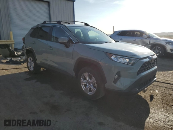 2019 Toyota RAV4 XLE with VIN 2T3P1RFV2KW020266, listed as a Copart auction lot 52183905 with 64,540 mi miles and Salvage title. Bid and sale history available at DreamBid. Image 4.