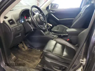 2014 Mazda CX-5 Grand Touring with VIN JM3KE4DY4E0344320, listed as a Copart auction lot 51731885 with 115,396 mi miles and Clean Title. Bid and sale history available at carsss.com. Image 7.