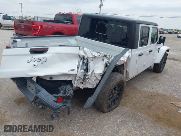 2023 Jeep Gladiator Overland z VIN 1C6HJTFG7PL566484, wystawiony jako IAAI lot #42424428 z przebiegiem 52 057 mil mil oraz . Historia ofert i sprzedaży dostępna na DreamBid. Obrazek 4.