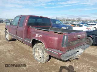 1997 Chevrolet Silverado 1500 with VIN 2GCEK19R5V1158174, listed as a IAAI auction lot 41461174 with 213,141 mi miles and . Bid and sale history available at DreamBid. Image 3.