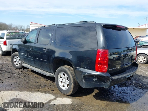 2014 GMC Yukon XL SLT with VIN 1GKS2KE77ER199723, listed as a IAAI auction lot 41555112 with 215,436 mi miles. Bid and sale history available at carsss.com. Image 3.